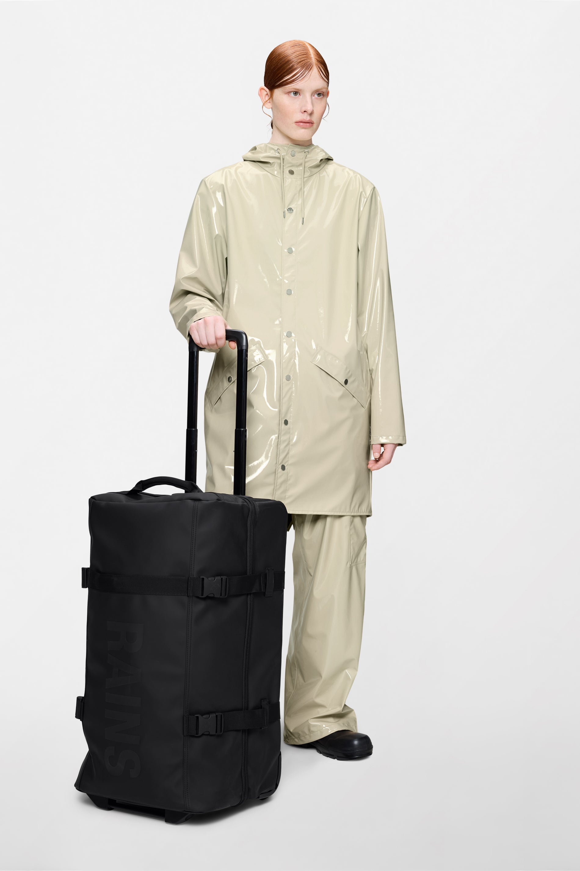 RAINS Texel Check-in Bag Black 62L H66 x D31 x W38 cm Suitcase