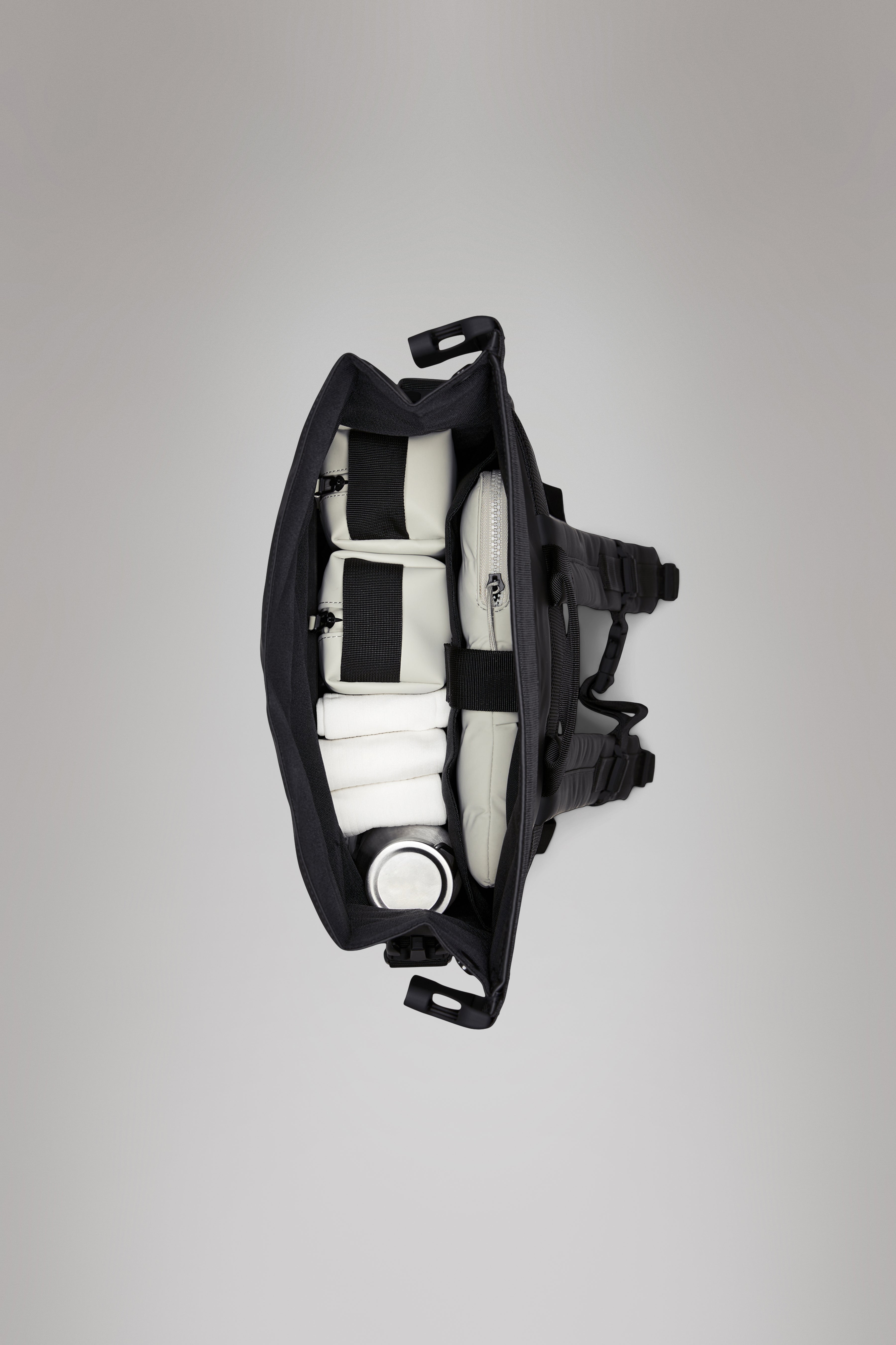 RAINS Trail Rolltop Backpack Lagoon 22L H47 x D13 x W36 cm Backpack